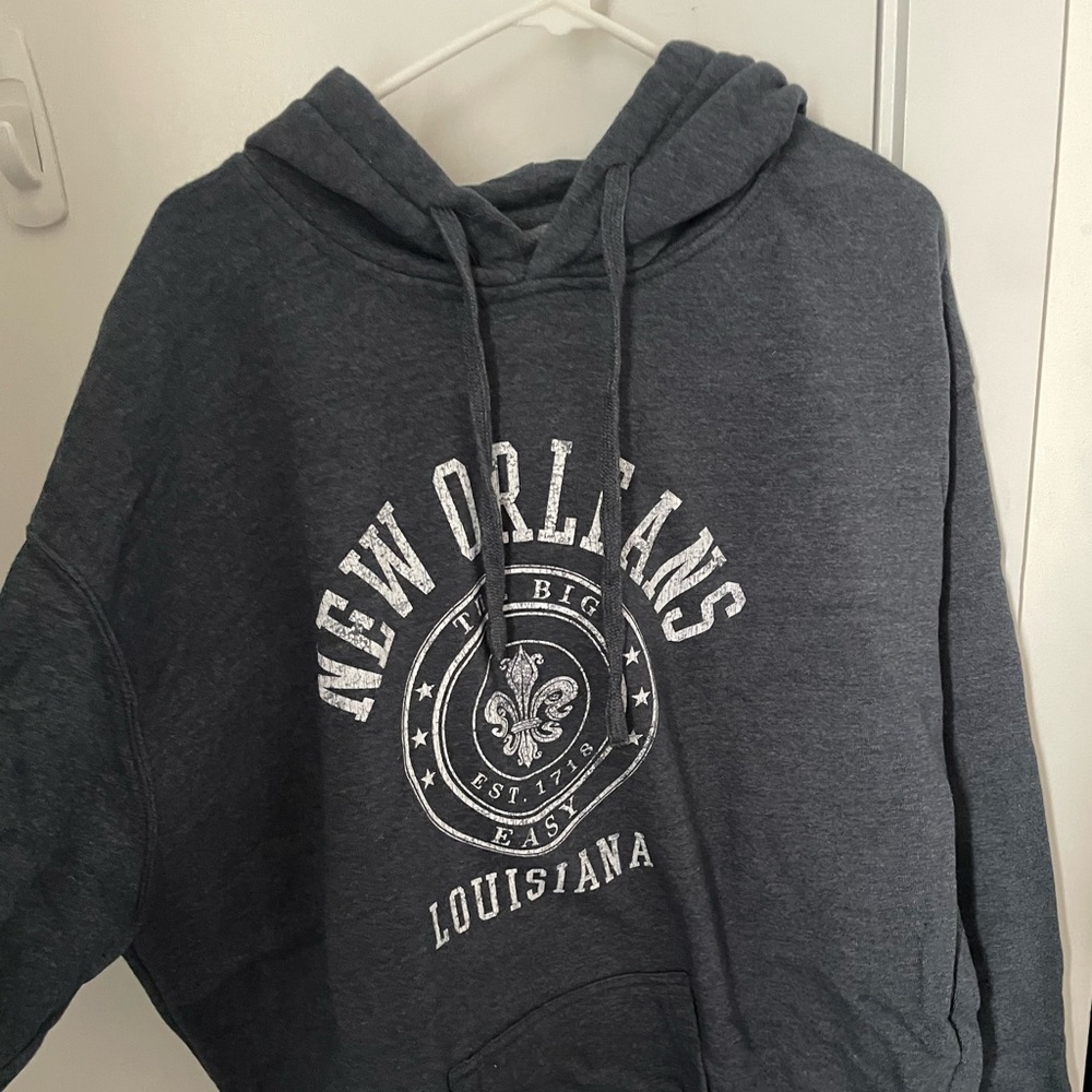 NOLA Sweatshirt. Very soft and warm. Dark gray/black color. Size XL.